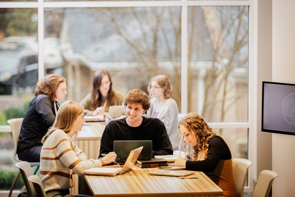 Students studying around table
